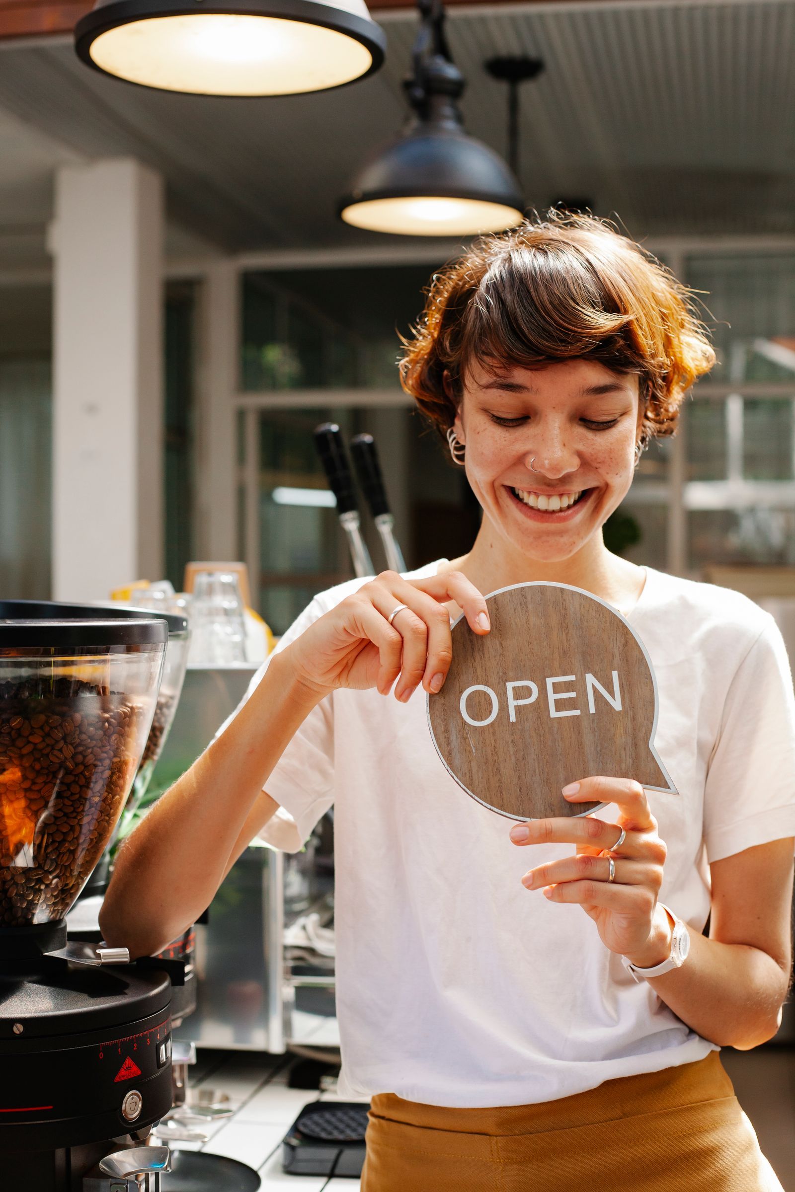 Small business owner at their storefront